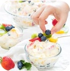 A bowl of ice-cream with fresh fruit