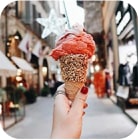 A photo of an ice-cream cone in the picturesque street